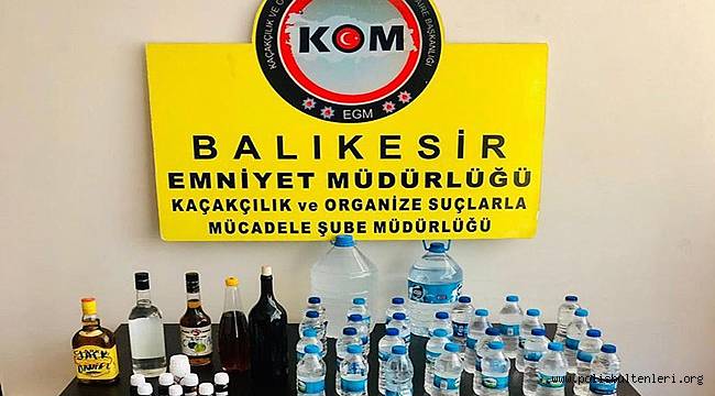 EVDE SAHTE İÇKİ İMALATINA POLİS BASKINI 