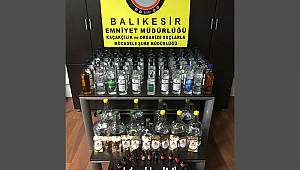 EVDE KAÇAK İÇKİ ÜRETTİ, İŞ YERİNDE SATTI 