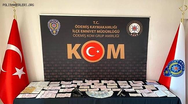 İzmir'de tefecilik yaptığı şüphesiyle 2 kişi gözaltına alındı