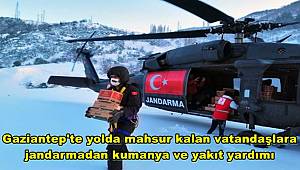 Gaziantep'te yolda mahsur kalan vatandaşlara jandarmadan kumanya ve yakıt yardımı