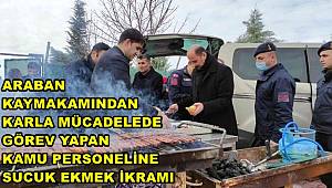 Kaymakam Sevgili’den, karla mücadelede görev yapan kamu personeline mangalda sucuk ekmek ikramı