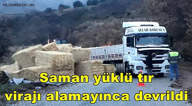 Manisa'da saman yüklü tır virajı alamayınca devrildi