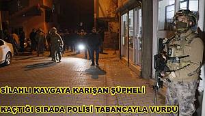 Silahlı kavgaya karışan şüpheli kaçtığı sırada polisi tabancayla vurdu 