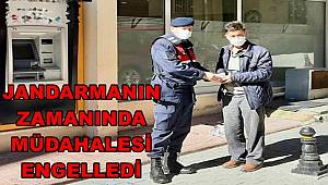 Dolandırıcılara para yatırırken Jandarma engelledi