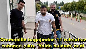 Otomobilin bagajından 11 ruhsatsız tabanca çıktı, 'Yolda buldum' dedi