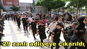 Telefon dolandırıcılığı operasyonunda gözaltına alınan 29 zanlı adliyeye çıkarıldı