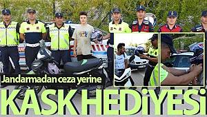 Jandarmanın kasksız sürücülere ceza yerine kask hediyesi şaşırttı 
