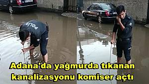Adana'da yağmurda tıkanan kanalizasyonu komiser açtı
