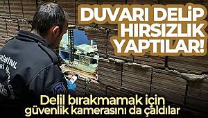 Duvarı delip hırsızlık yaptılar, delil bırakmamak için güvenlik kamerasını da çaldılar 