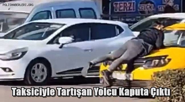 Taksiciyle Tartışan Yolcu Kaputa Çıktı 