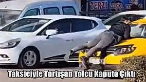 Taksiciyle Tartışan Yolcu Kaputa Çıktı 