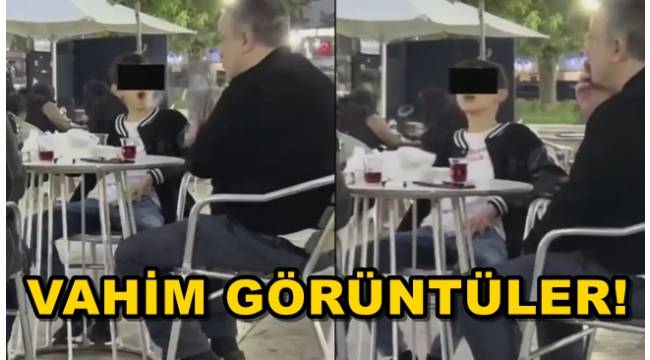 Vahim görüntüler! Küçücük çocuk ailesinin yanında sigara içti, bir de halka çıkardı 